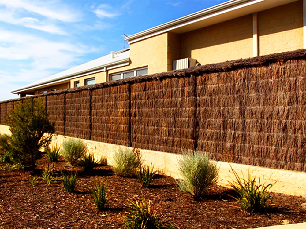 Brushwood fence around a residential property