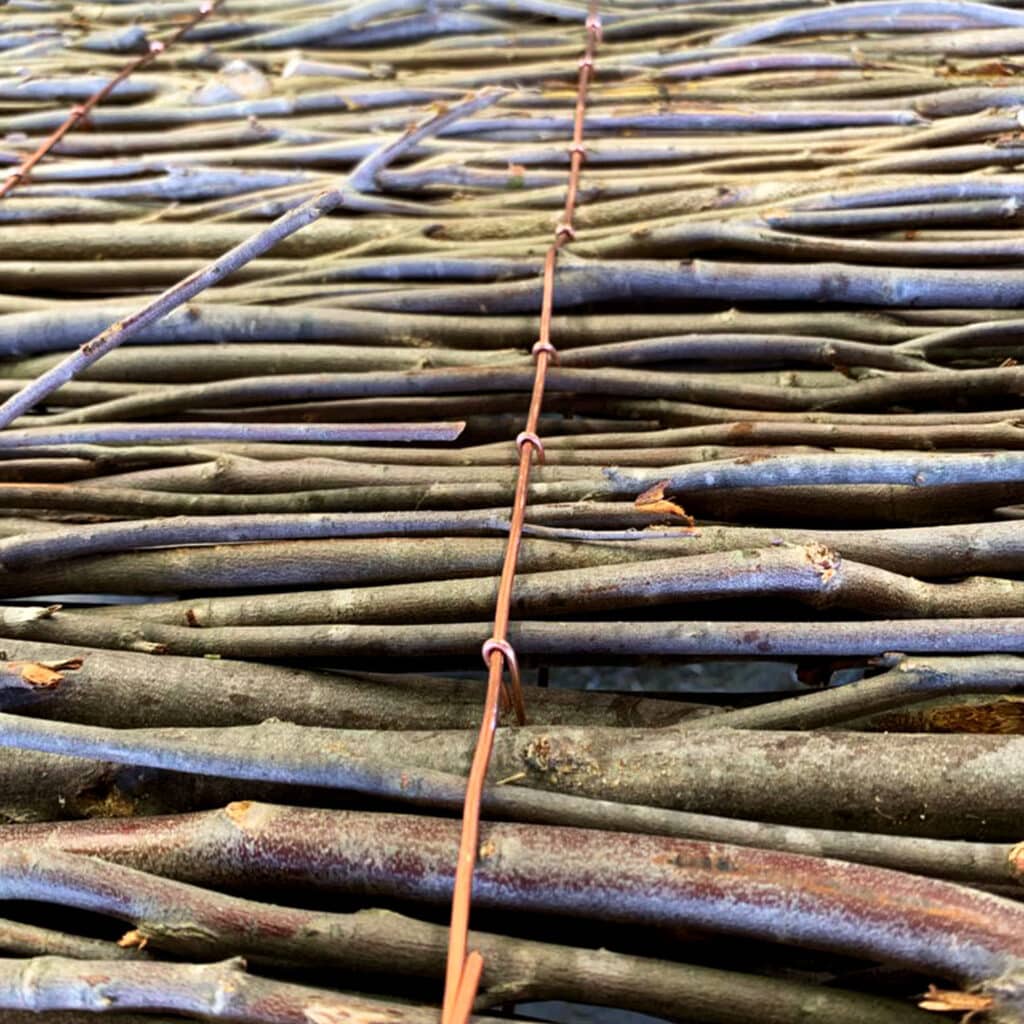 Close up of durable brushwood sticks bound together