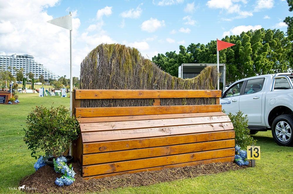 Large horse jump with brushwood inserts in a nice park